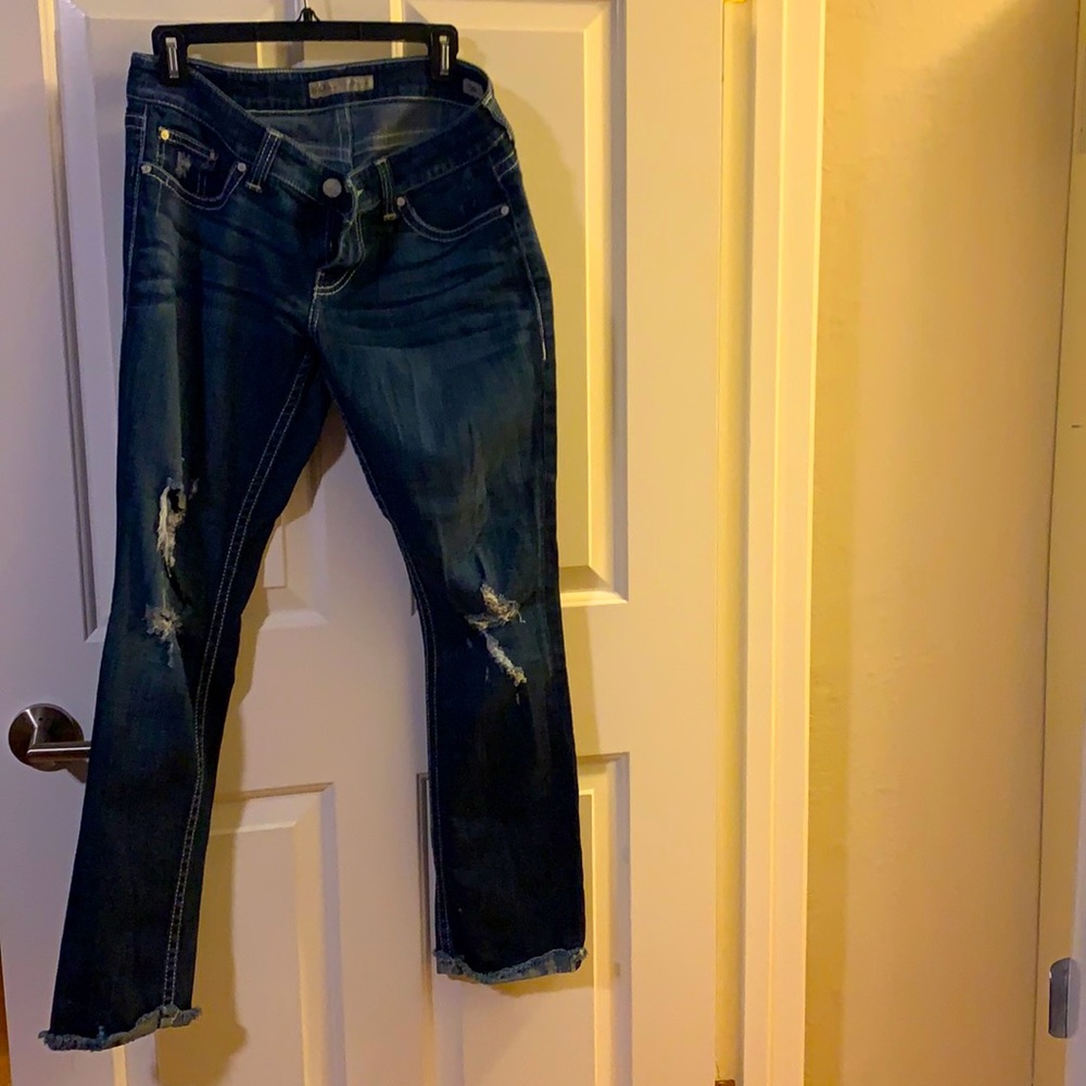 Ripped knee jeans